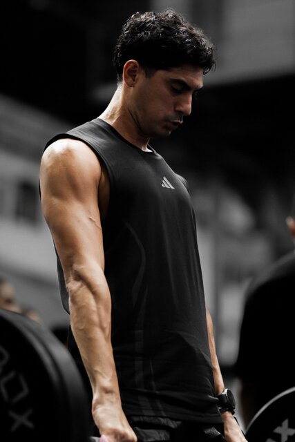 An athlete performs a barbell deadlift in the Strength Zone